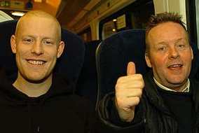 Chris and Martin on the GNER back to London - or maybe it's on the way to Darlo, as they look cheerful.