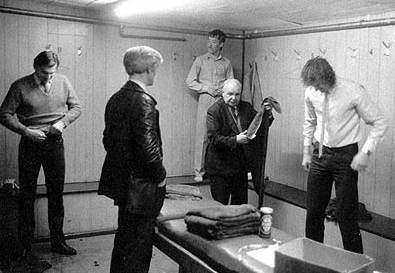 Dressing room scene, that's a can of Harp among the towels